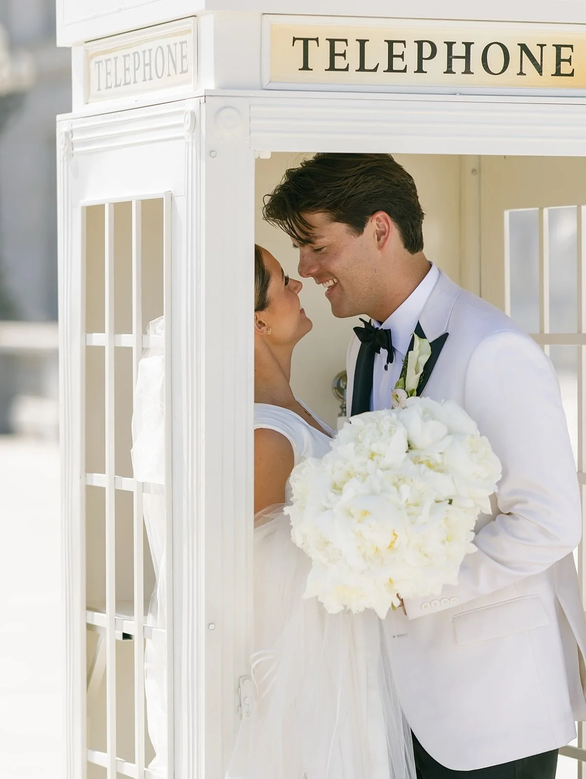 Ruth &amp; Sam&rsquo;s guestbook was anything but ordinary &mdash; a vintage phone booth from @indigo.utah where guests could step inside and leave a message for the newlyweds. A playful, heartfelt detail that turned their guestbook into an experienc