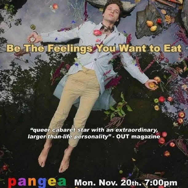 Natti Vogel lying down in dark water surrounded by fruits and flowers, with a headline that reads "Be The Feelings You Want to Eat" and promotional text about a queer cabaret star event on Monday, November 20th at 7:00 pm.