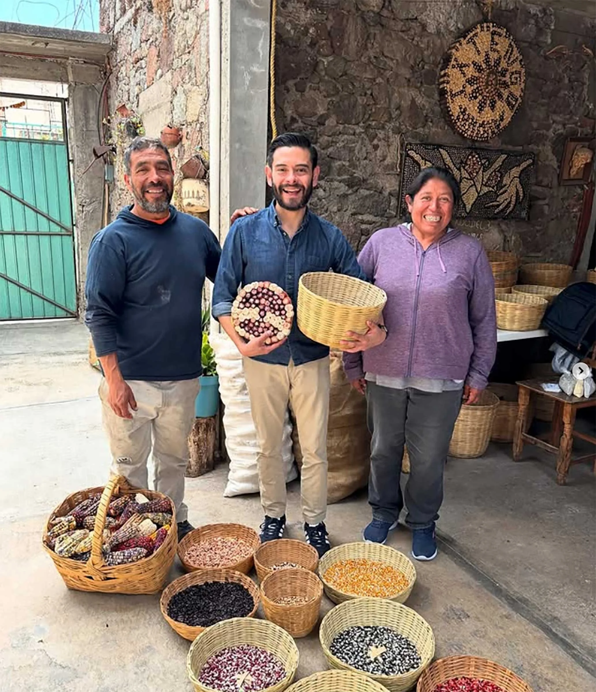 Geovanni (center) visiting Simón Angoa and his wife Ana Lilia at their home and corn warehouse in Ixtenco, Tlaxcala