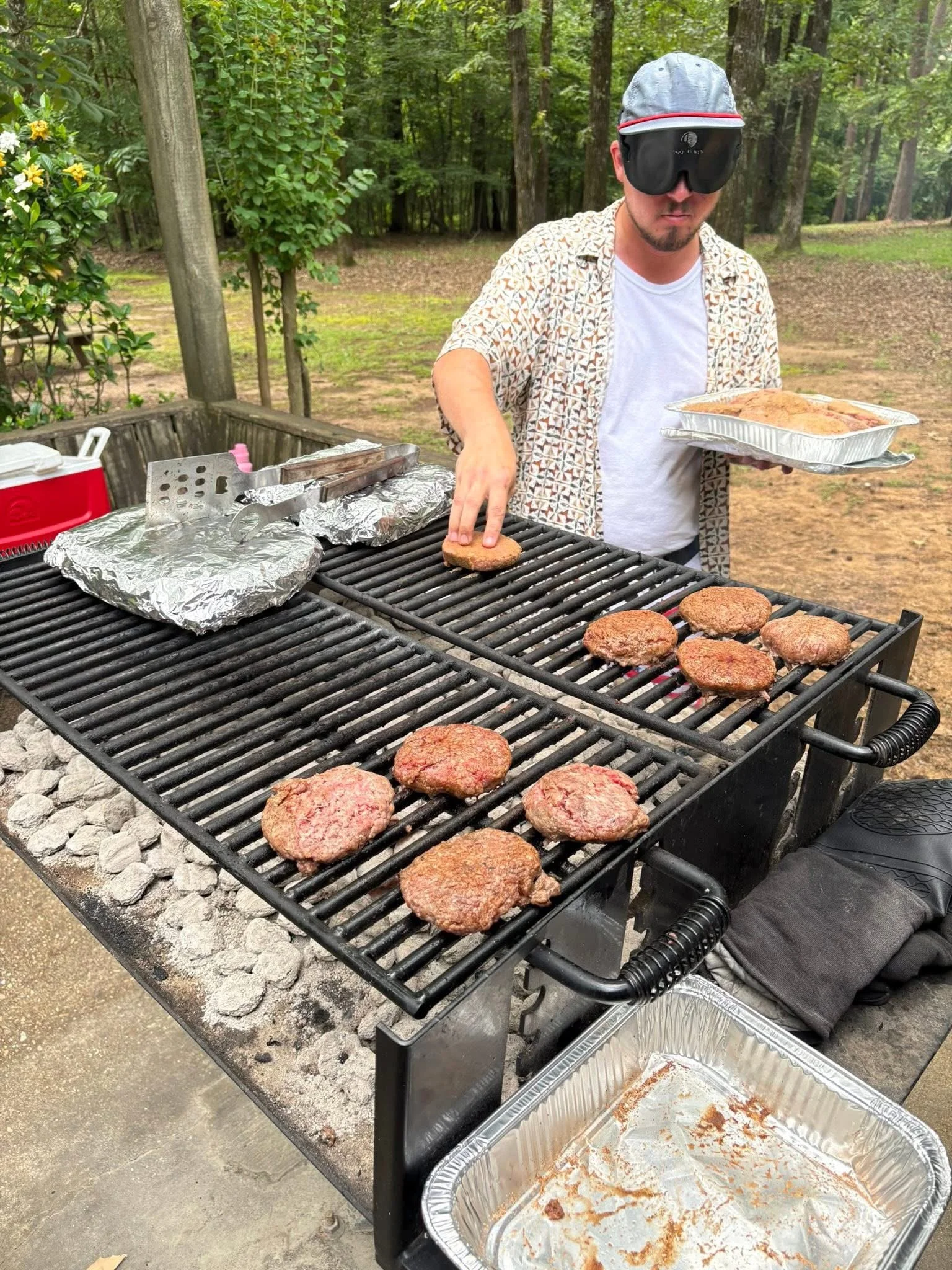 Student grilling at annual crawfish boil