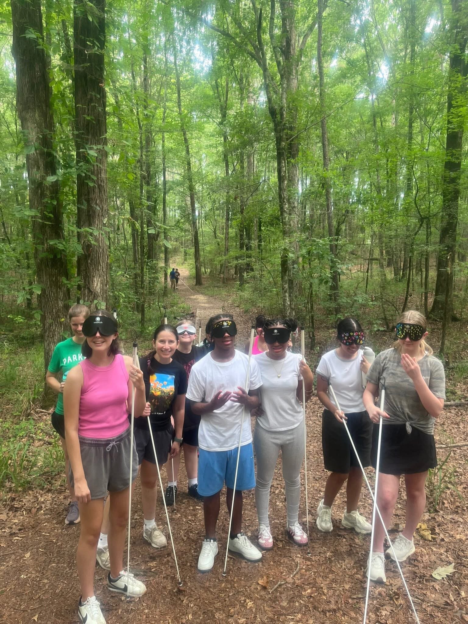 Teen students at Summer Edge Program posing for photo on trail