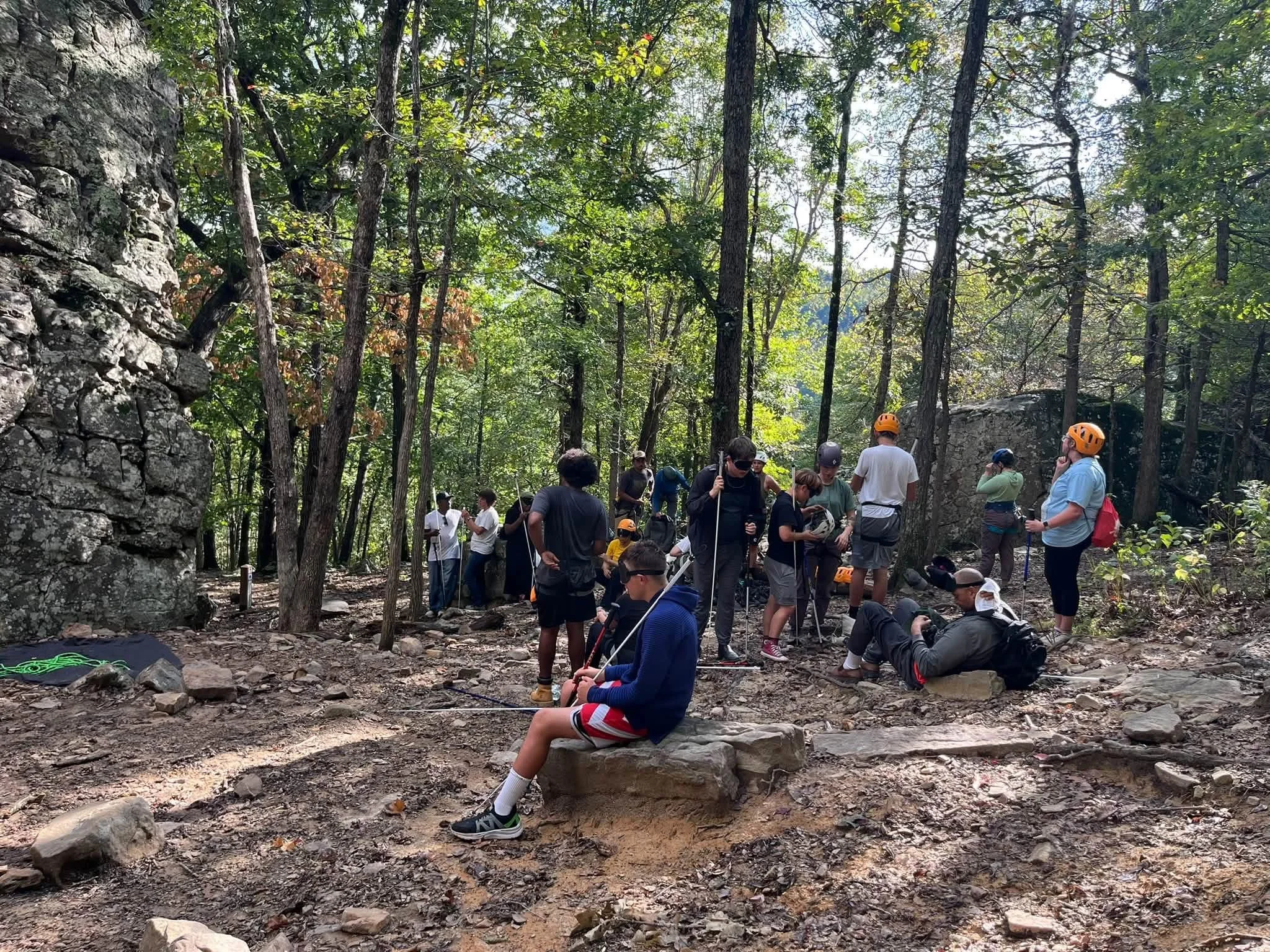 Students receiving rock climbing instructions
