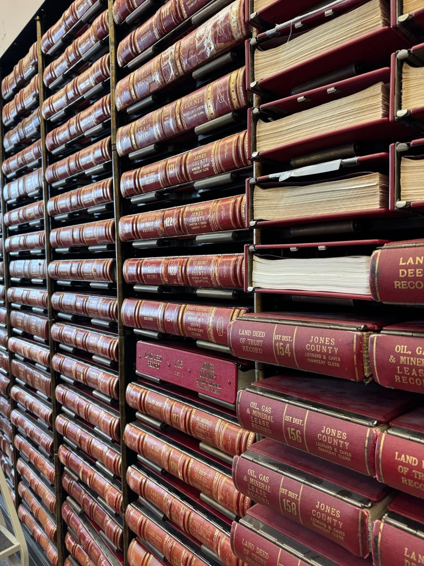 Behind every smooth real estate closing is a whole lot of careful research. 📚 Our team spends plenty of time in the record room at the courthouse, reviewing property documents and title histories to make sure every closing is accurate and secure.

A