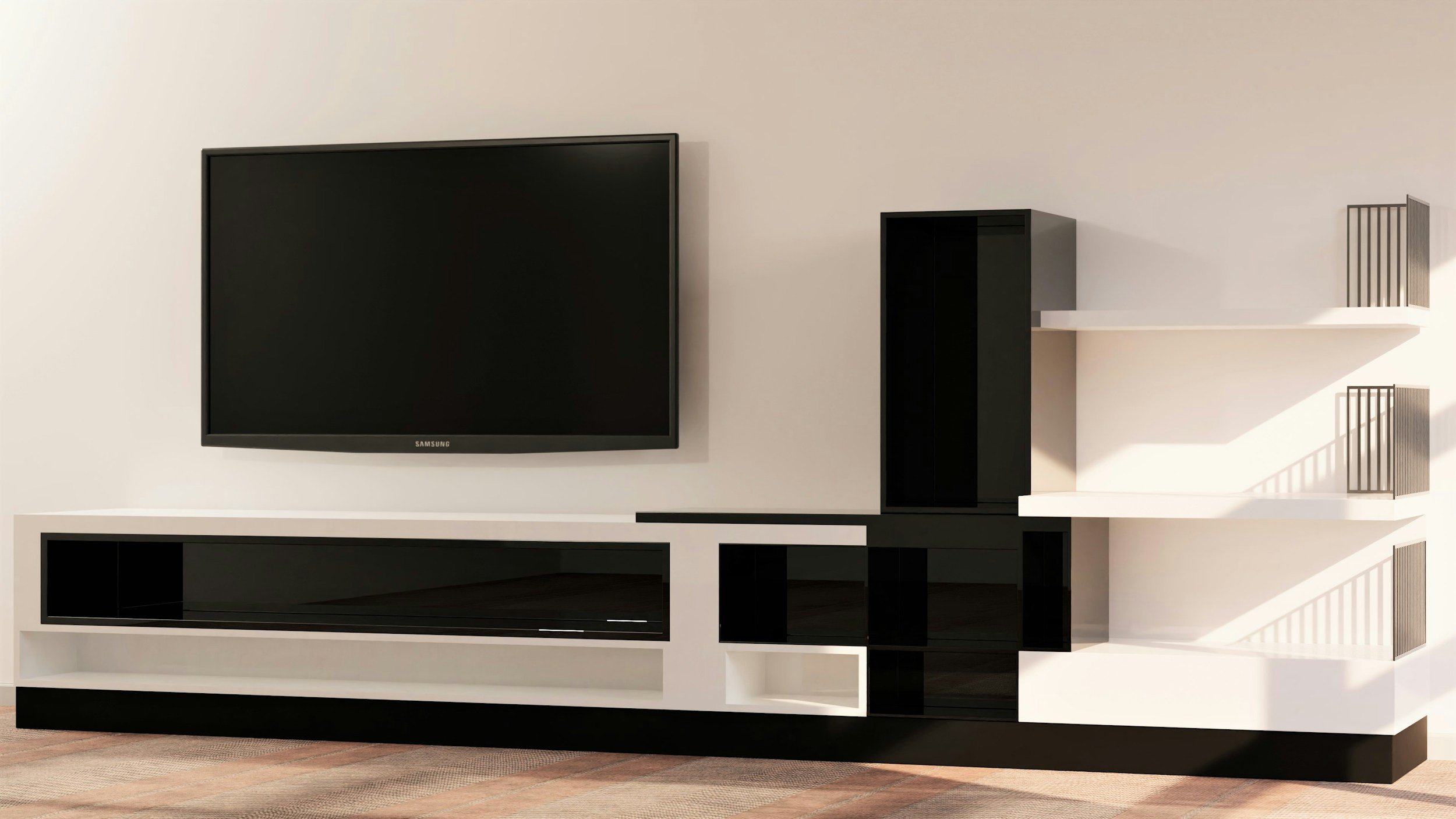 Modern black and white entertainment center with flat screen TV and open shelving on a white wall.