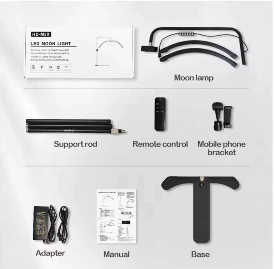 A box labeled 'HD-M5X LED Moon Light' with several accessories laid out around it. The accessories include a moon lamp with a flexible arm, a support rod, a remote control, a mobile phone bracket, an adapter, a manual, and a base.