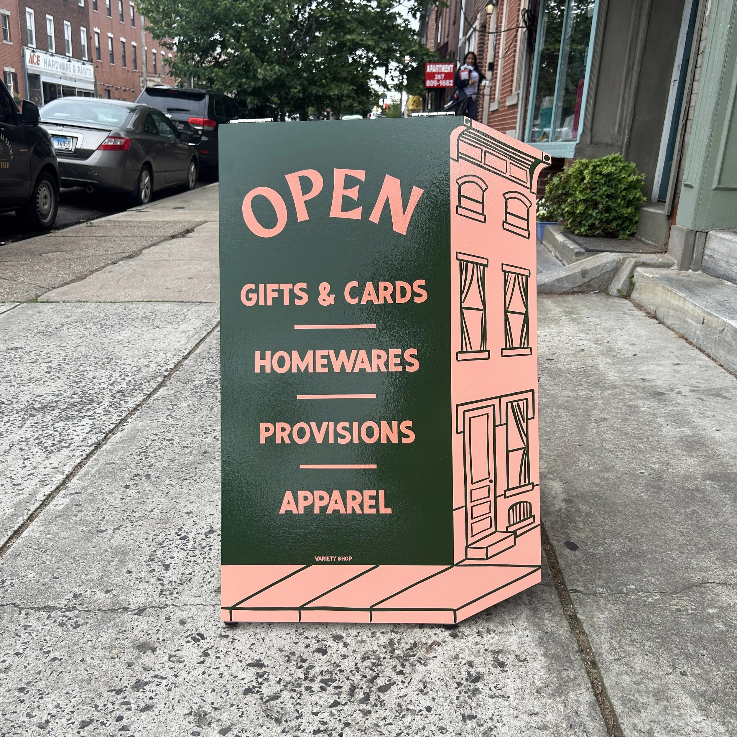 Sandwich board designed to mimic a classic Philly building.