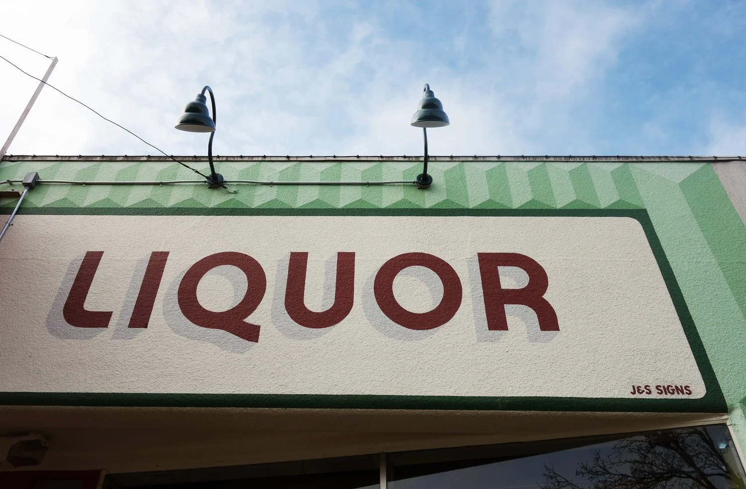 Liquor detail on storefront.