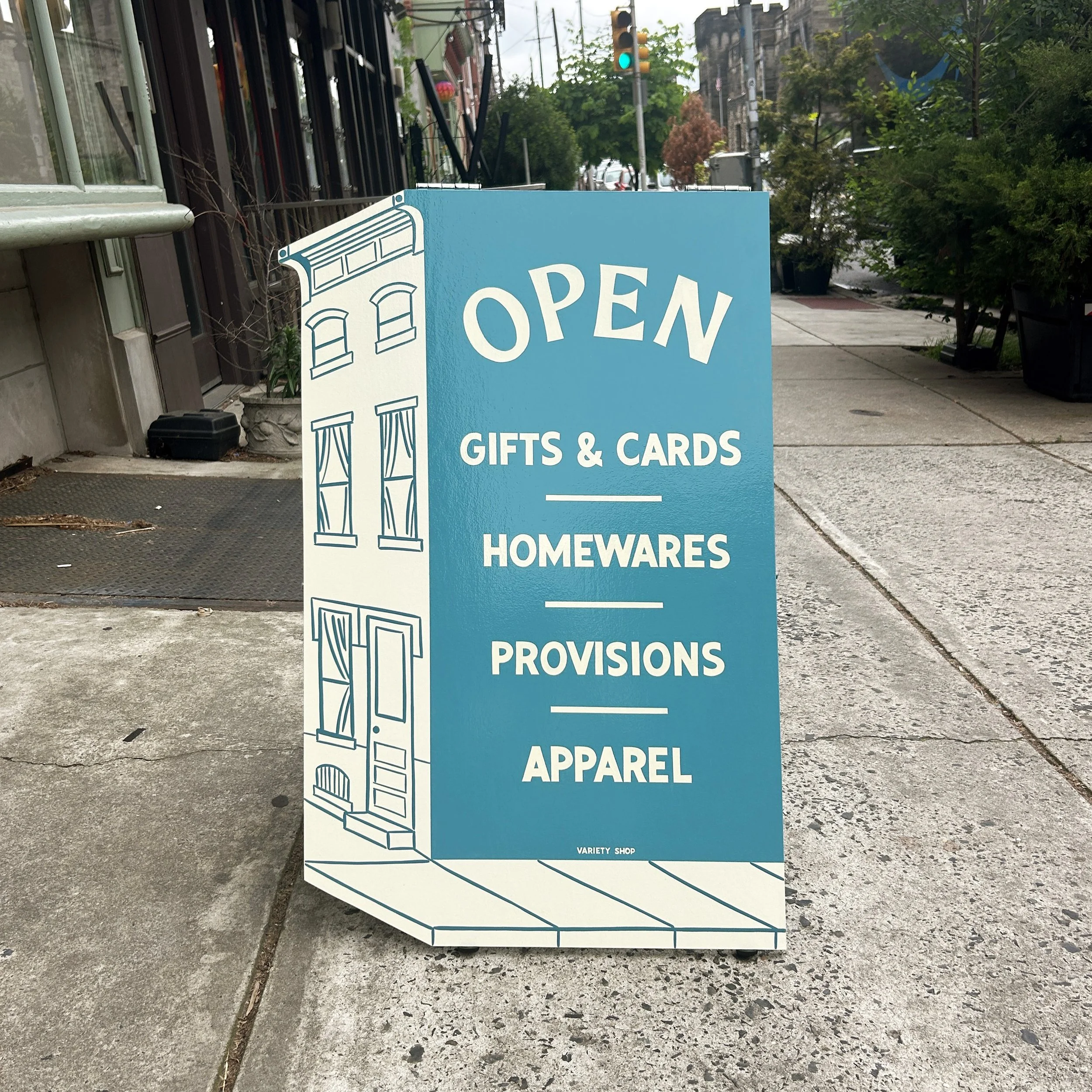 Sandwich board designed to mimic a classic Philly building.