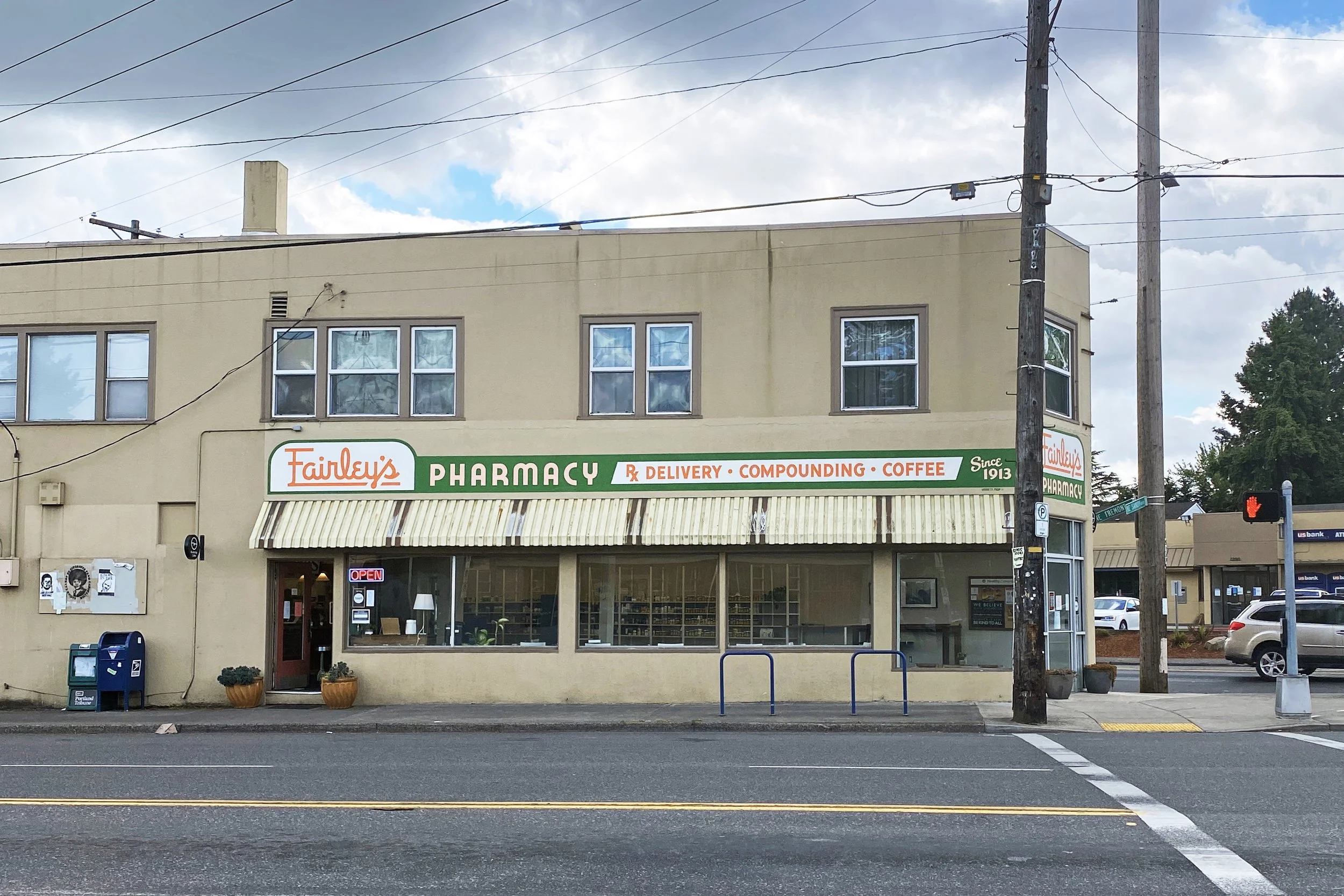 Side of Fairley's Pharmacy storefront