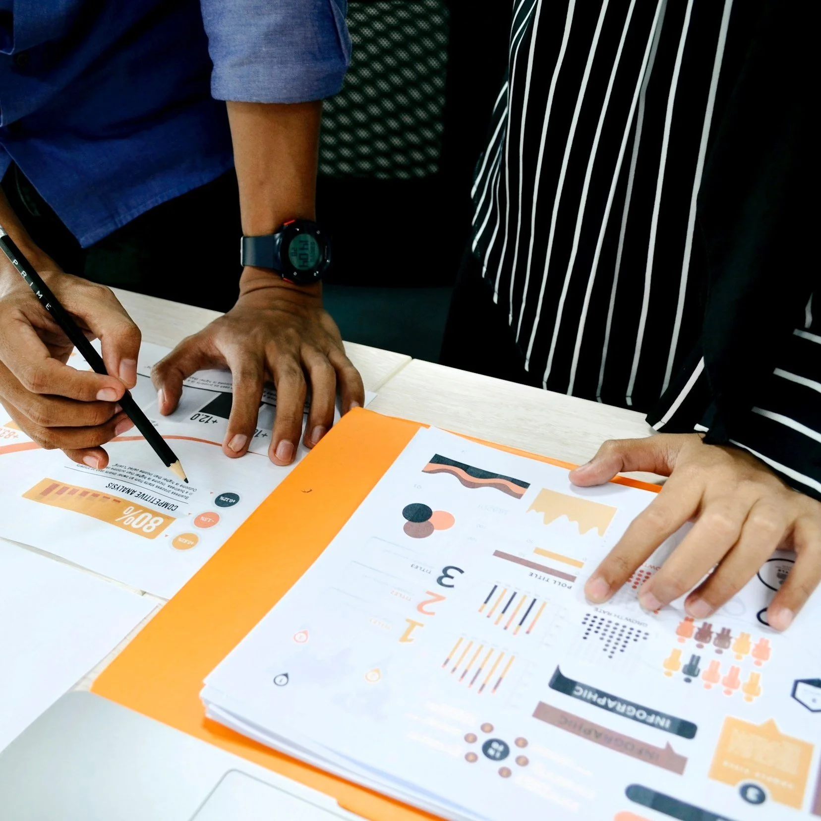 People collaborating on a board presentation