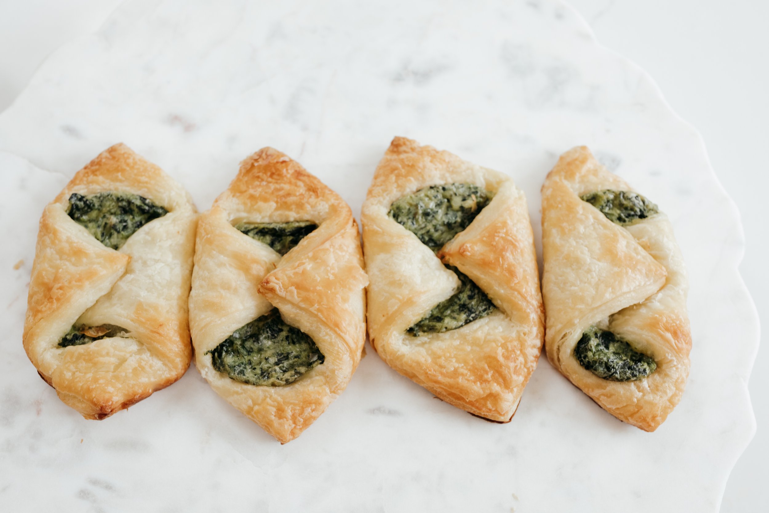 Savory foldover croissants ready to bake for your business