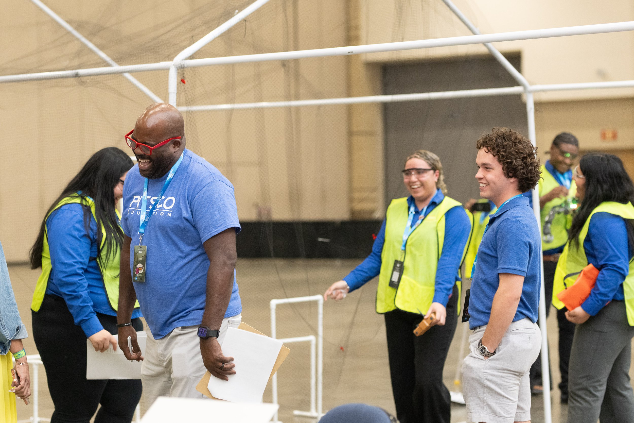 A TSA volunteer volunteers during a conference.