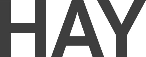 Close-up of the word 'HAY' in large black letters.