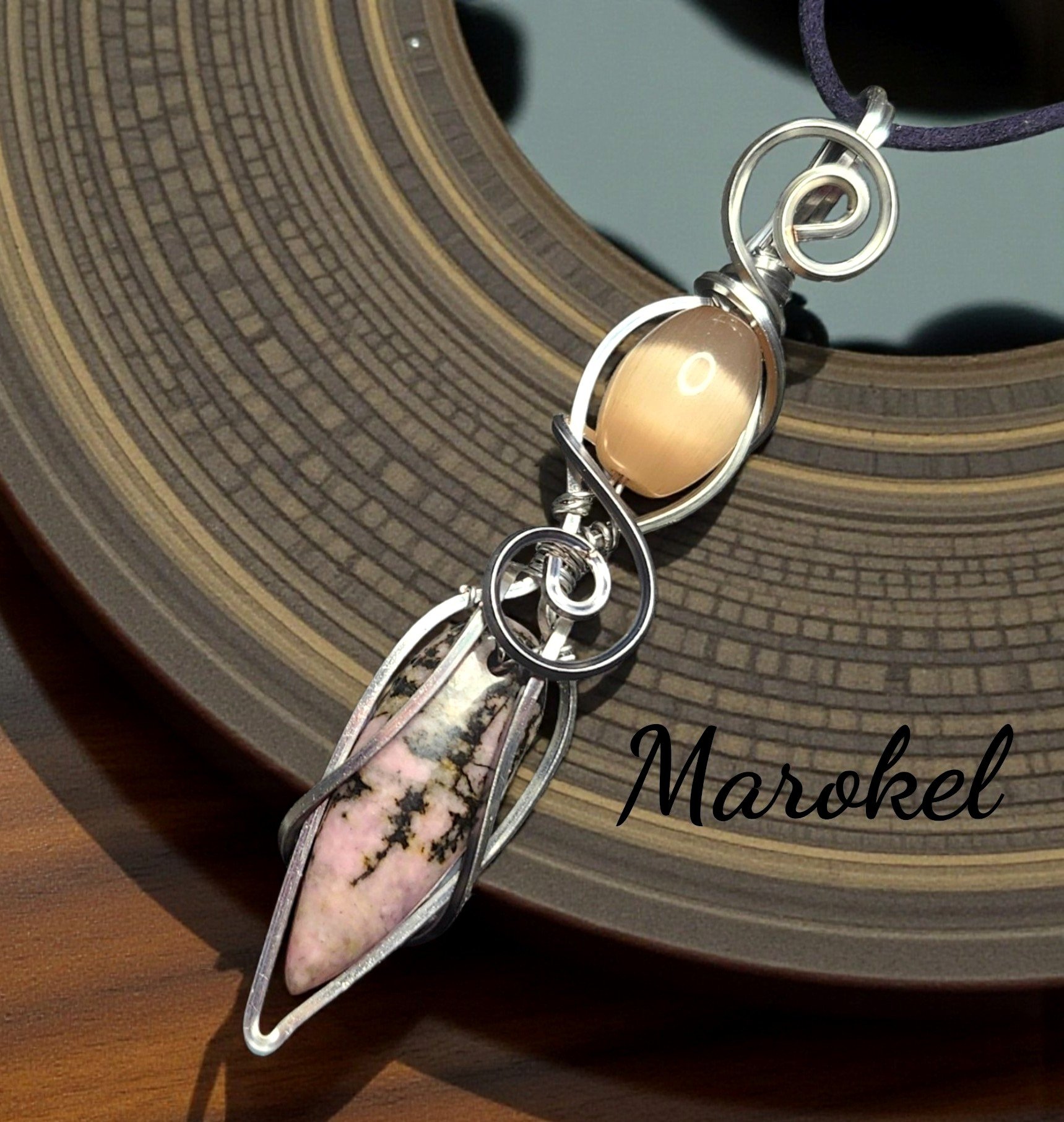 Black and Pink Rhodonite Pendant Titanium Wire Wrapped