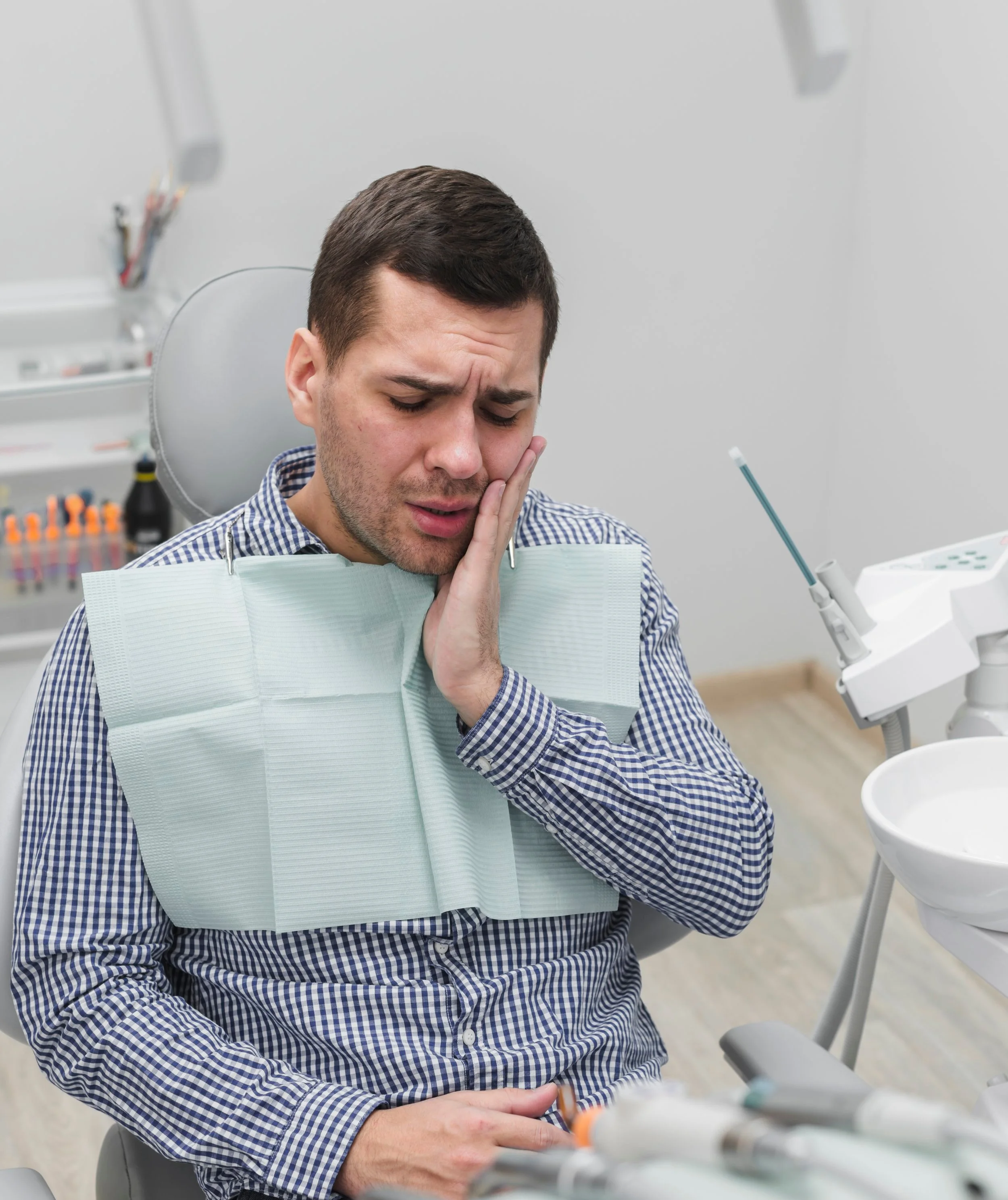 man-tooth-pain-at-dentist.jpg