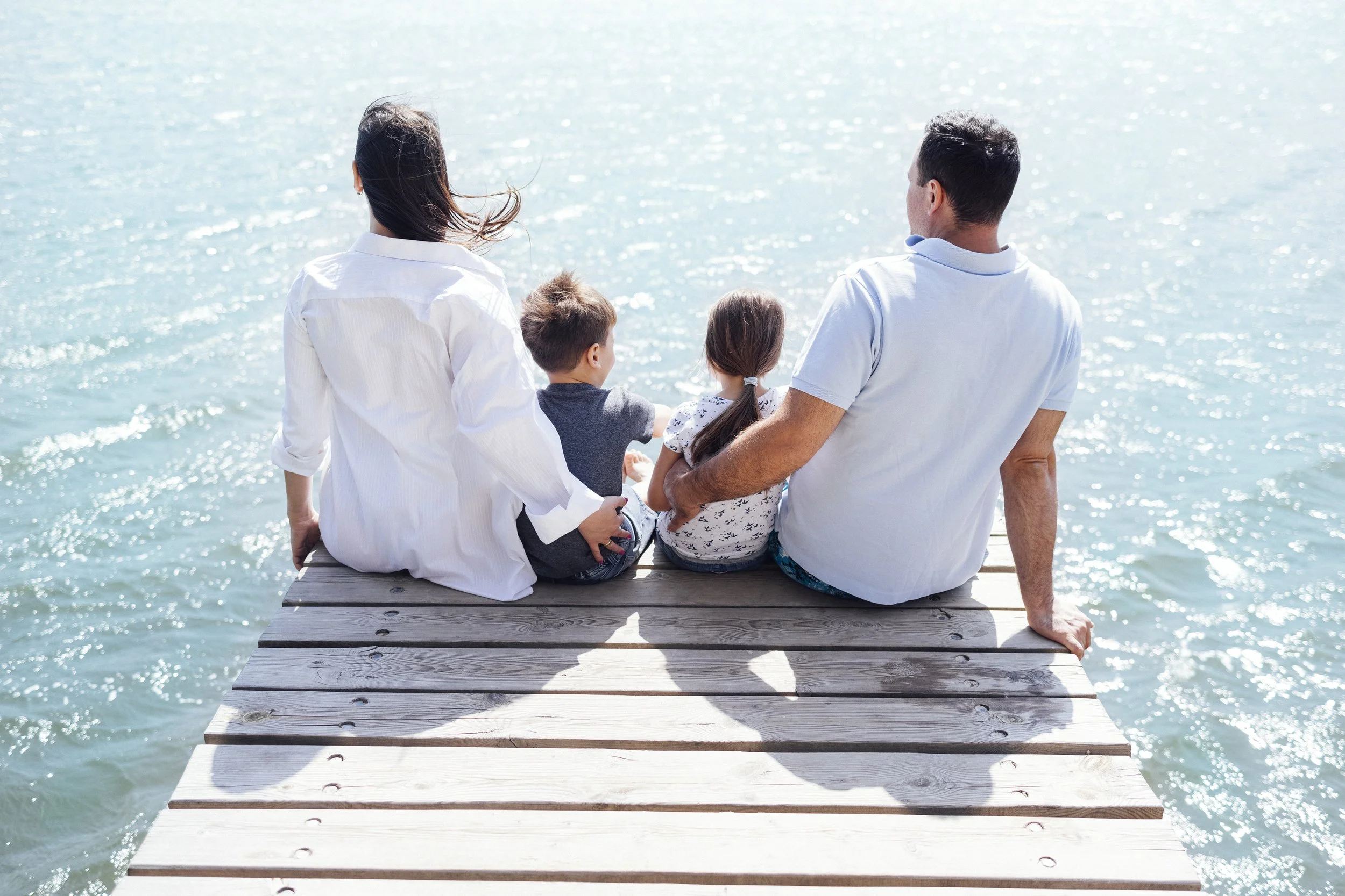 happy-family-on-wooden-bridge-against-the-backdrop-2025-01-09-04-31-05-utc.jpg