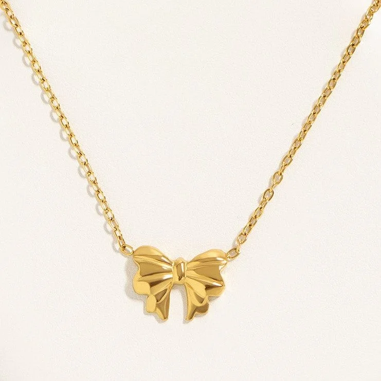 gold-bow-pendant-necklace-02.jpg