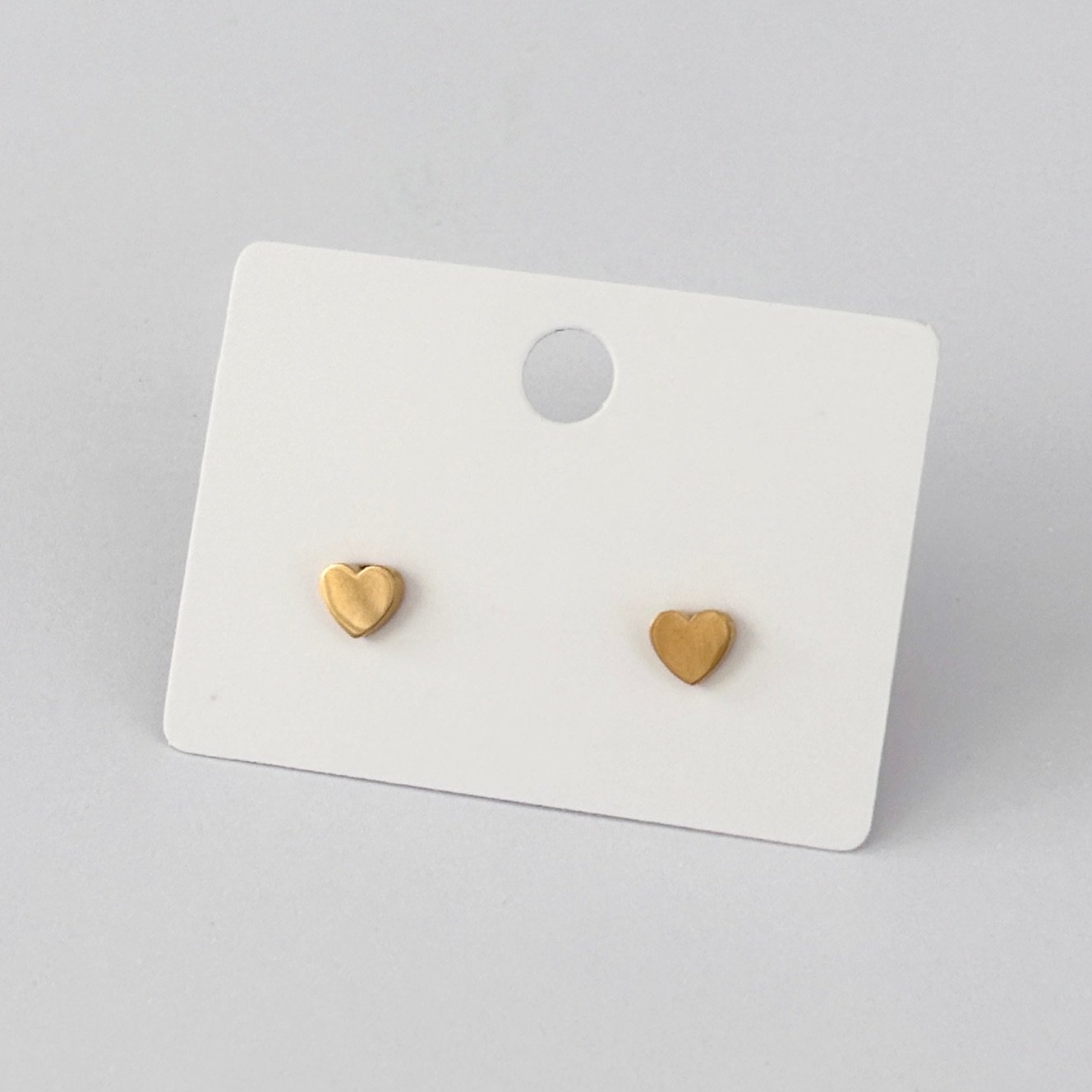 gold-tiny-heart-stud-earrings-02.jpg