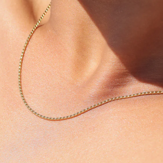 gold-dainty-serpentine-chain-necklace-03.webp