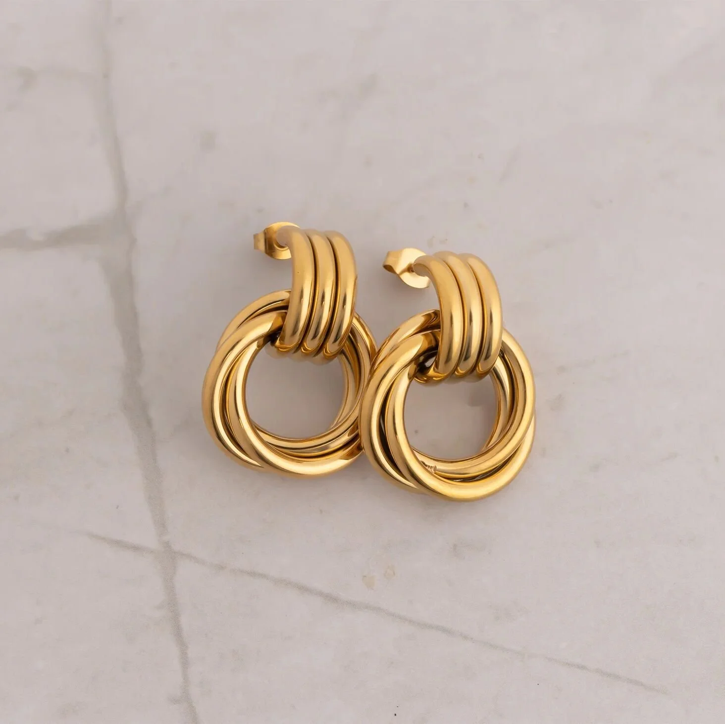 gold-gold-knot-statement-earrings-04.jpg