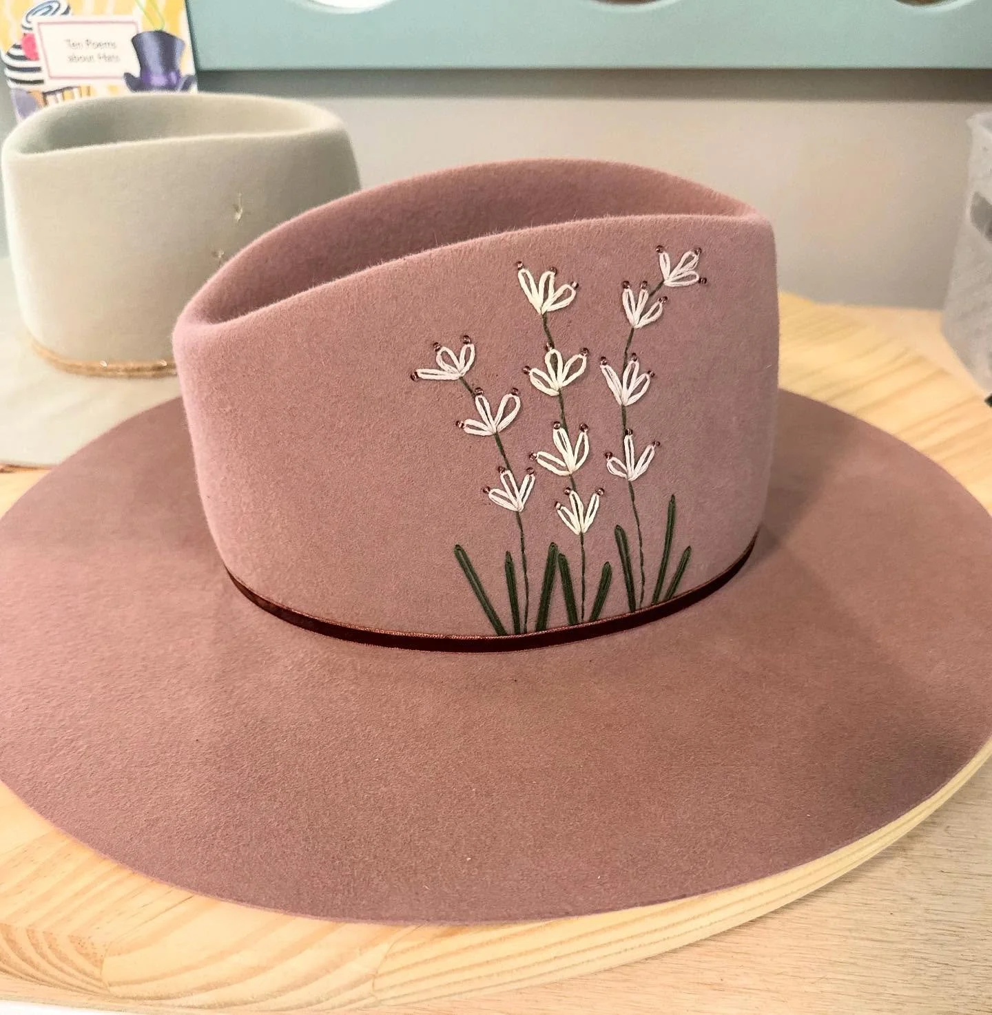 This one is called the &ldquo;Millie&rdquo; 👒🌸 Dainty flowers with just a hint of sparkle with the purple seed beads. I can&rsquo;t wait to send this one off to its new home!