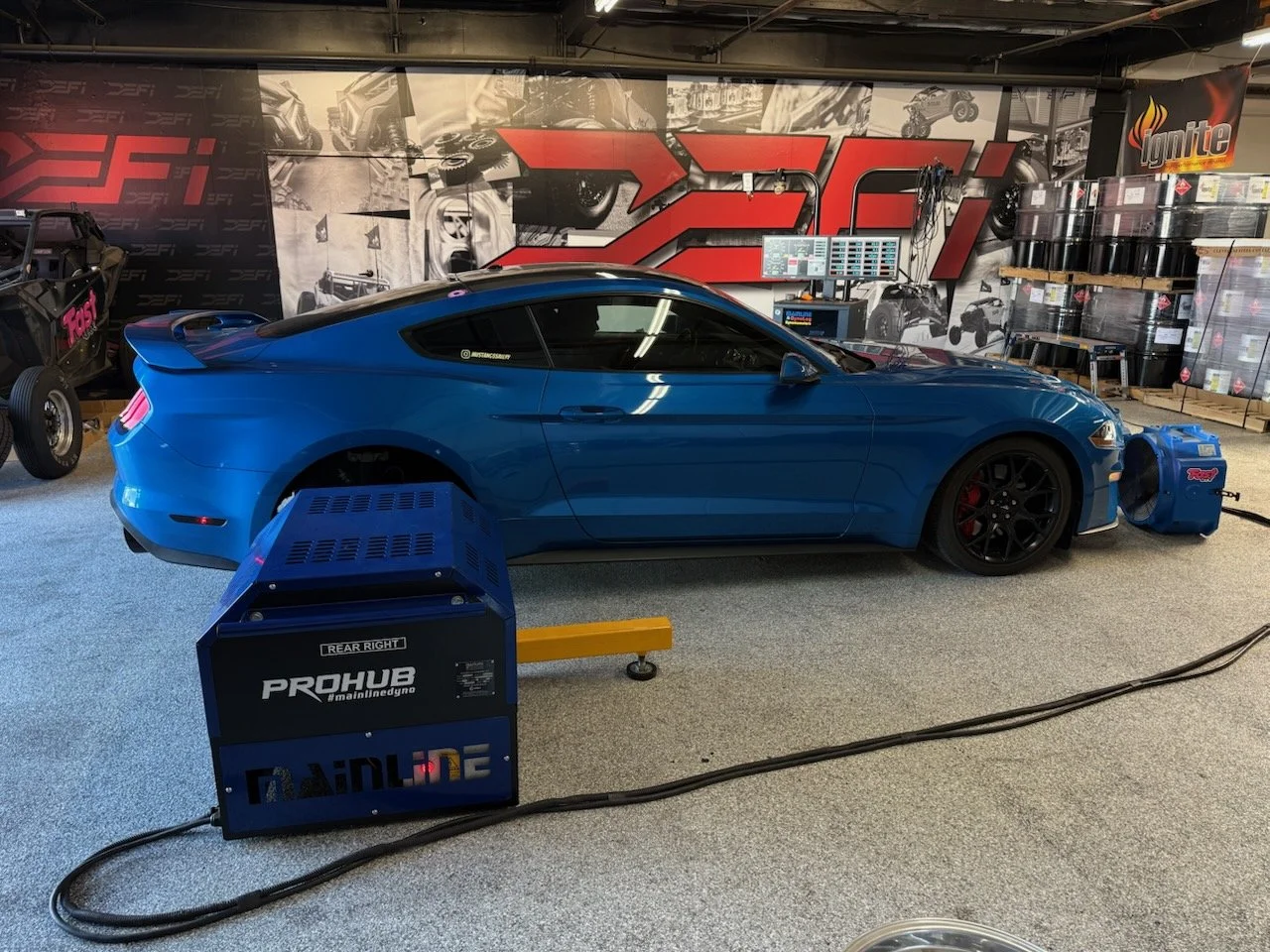defi-motorsports-blue corvette on mainline prohub machine.jpeg