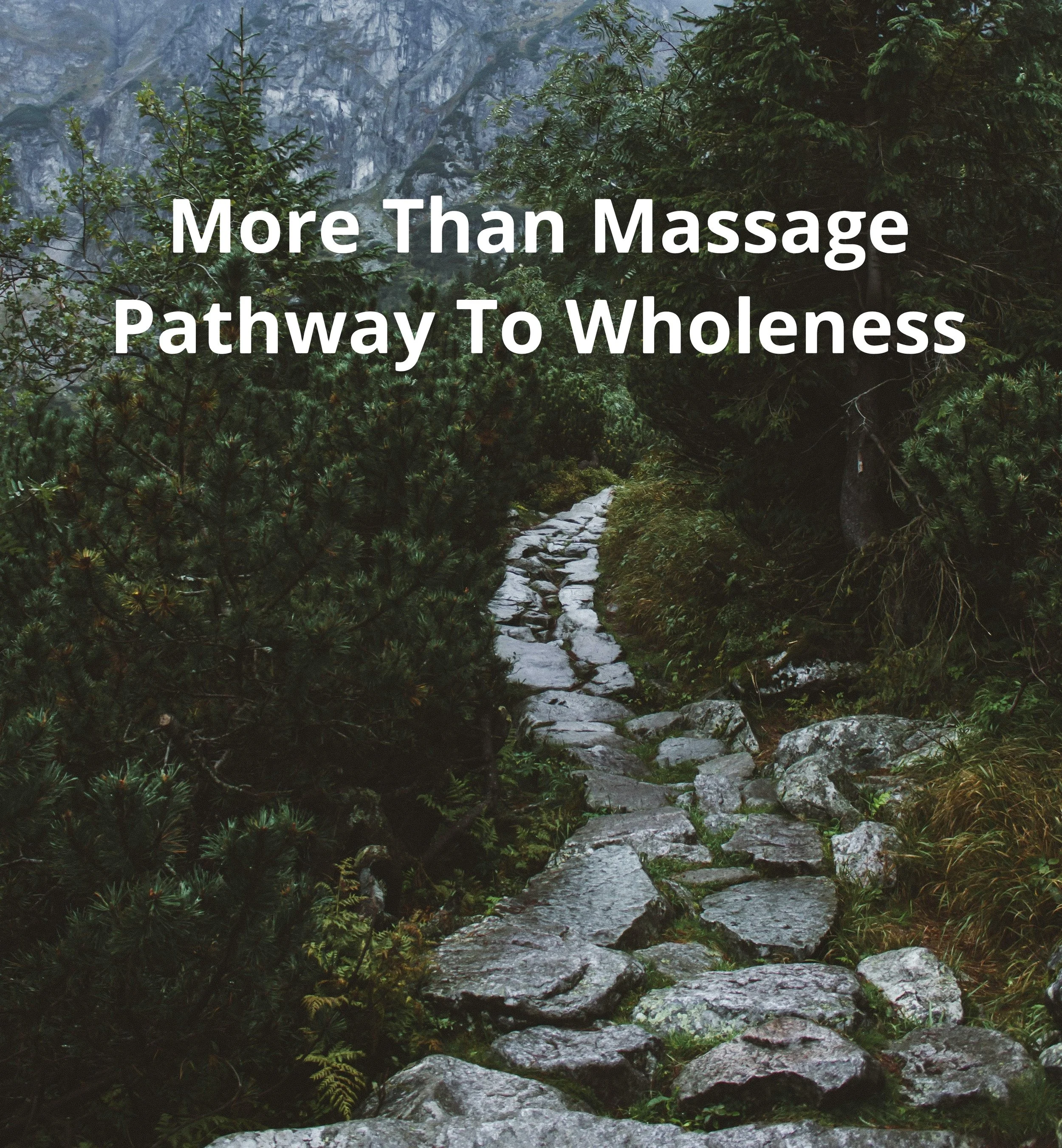 A nature trail with rocks surrounded by green trees and mountains in the background, overlaid with the text 'More Than Massage Pathway To Wholeness'.