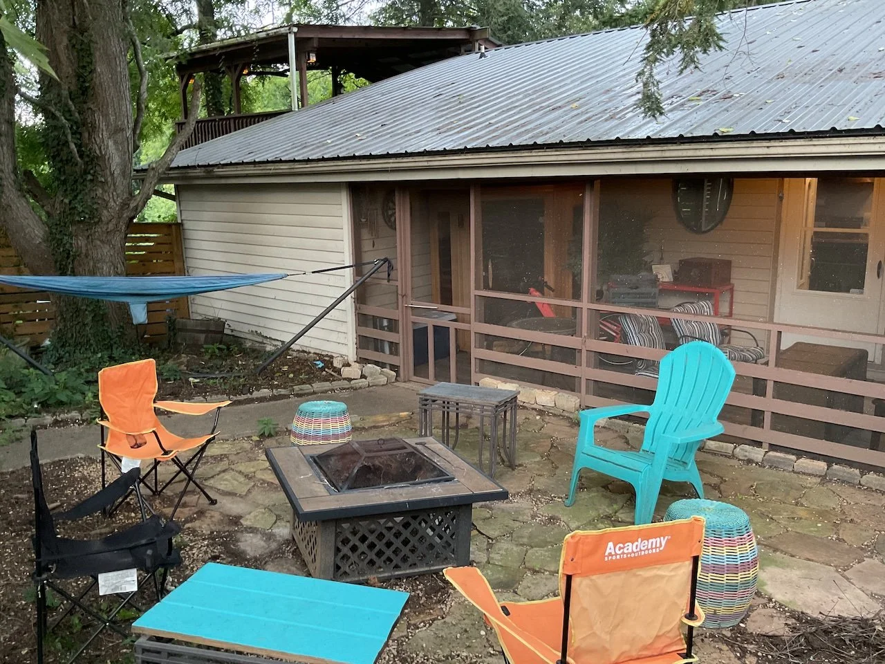 Firepit Front Porch and Treehouse Glimpse.jpeg