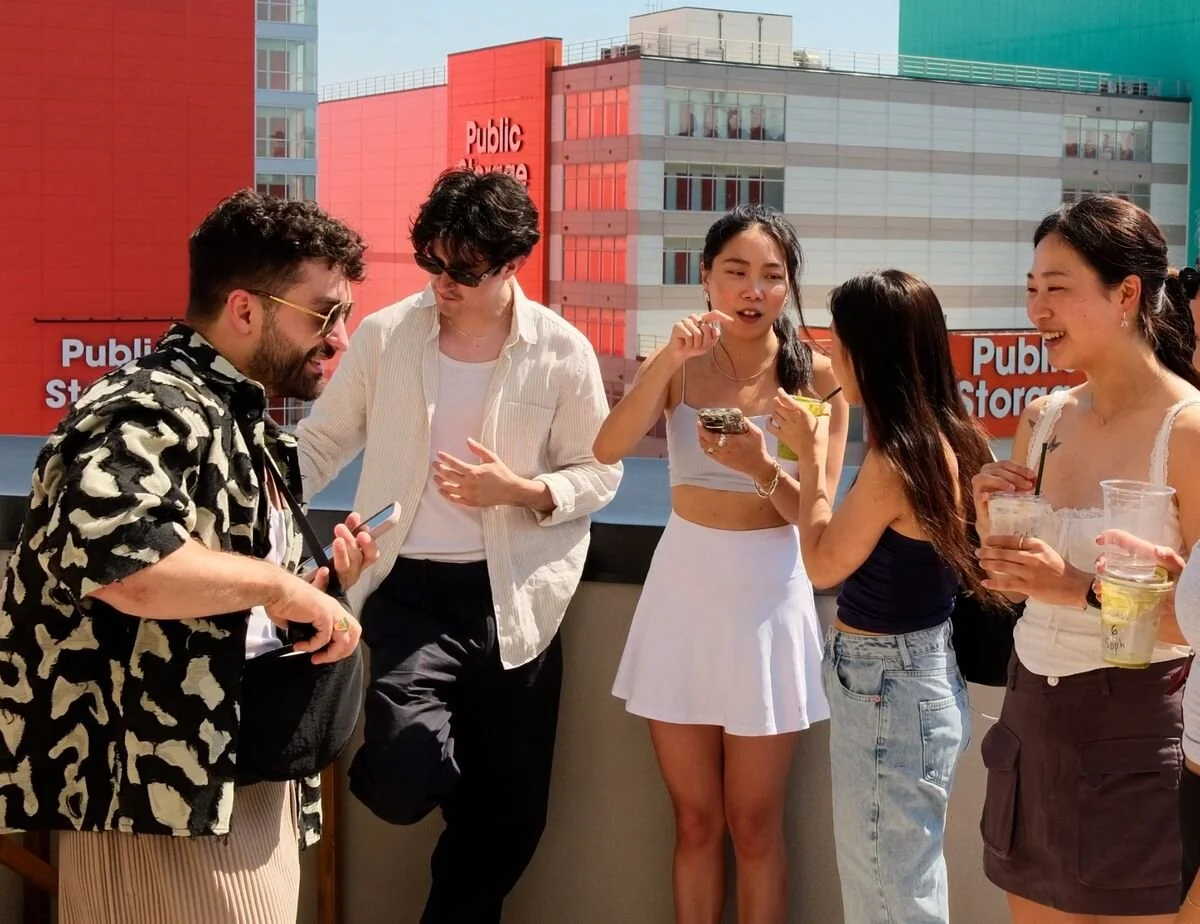 Guests enjoying Vietnamese coffee cocktails on a rooftop event in New York City with First Phin First mobile coffee bar