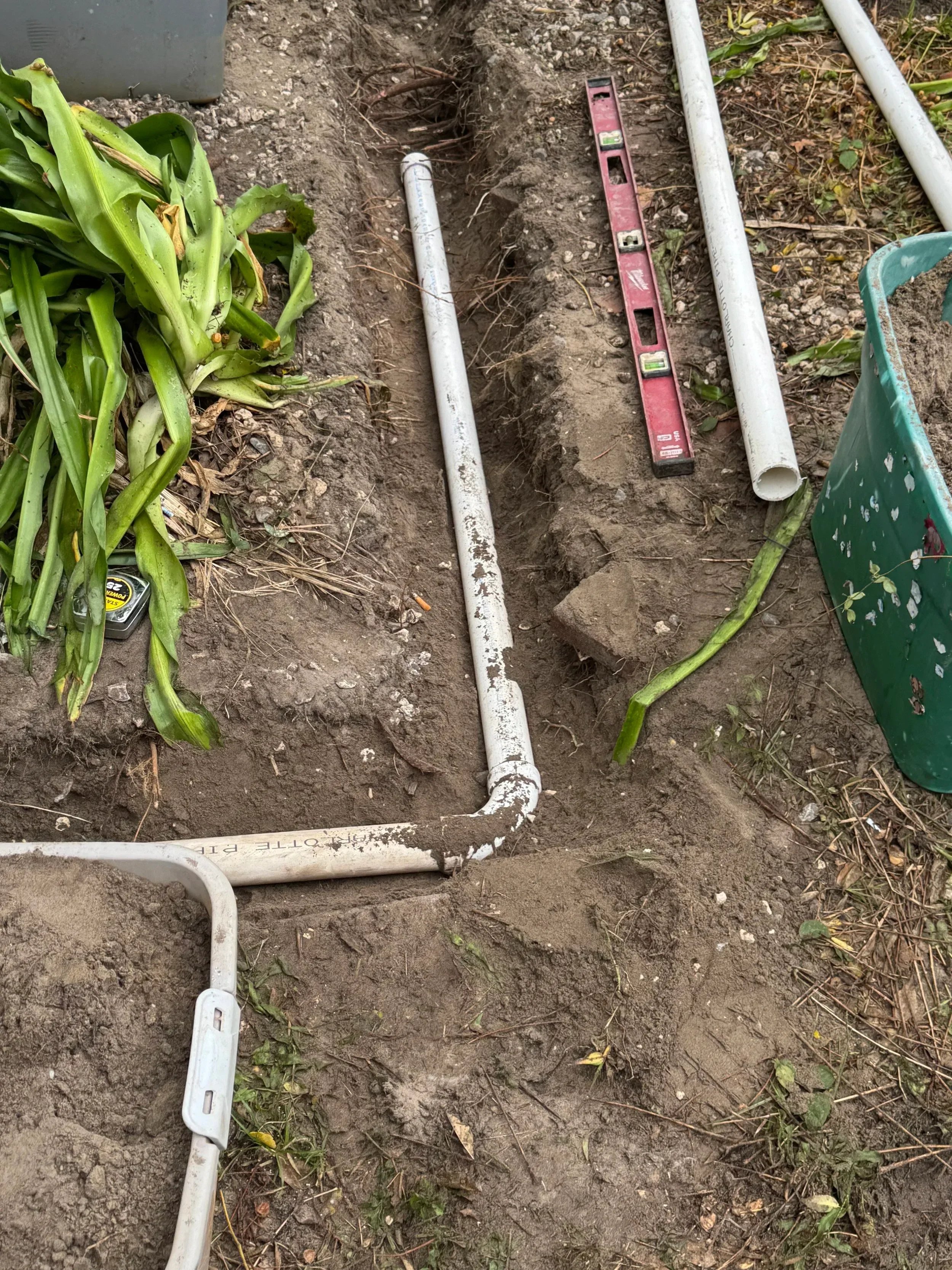 Plumber replacing corroded galvanized pipes with modern piping