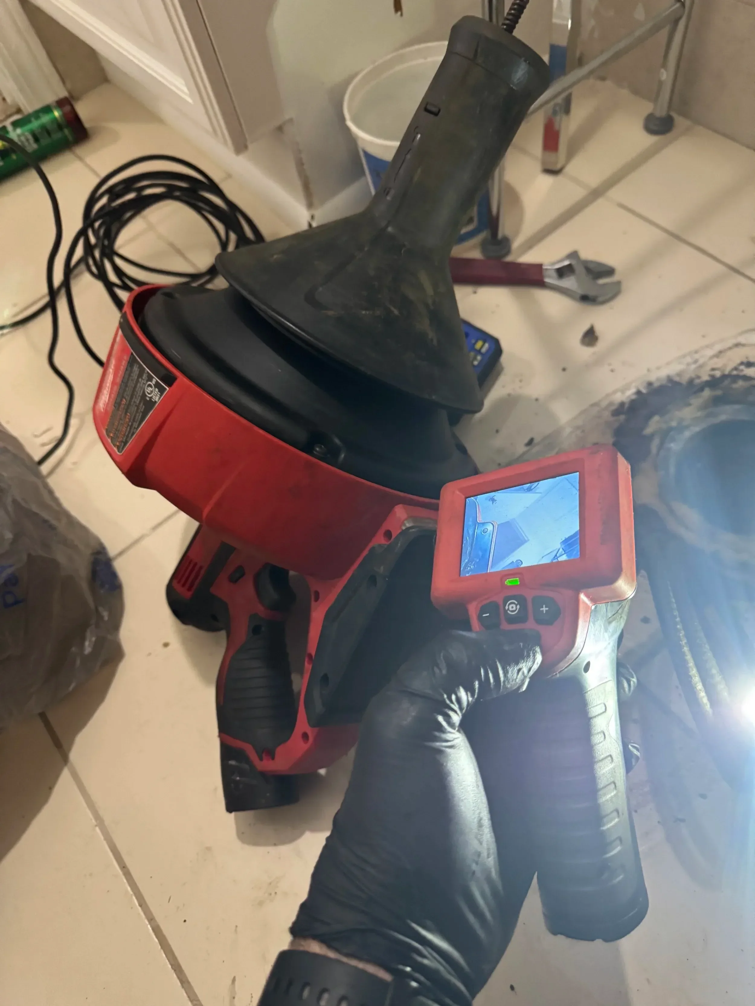 Clearing a main sewer line backup that caused multiple clogged toilets in a Duval County rental property.