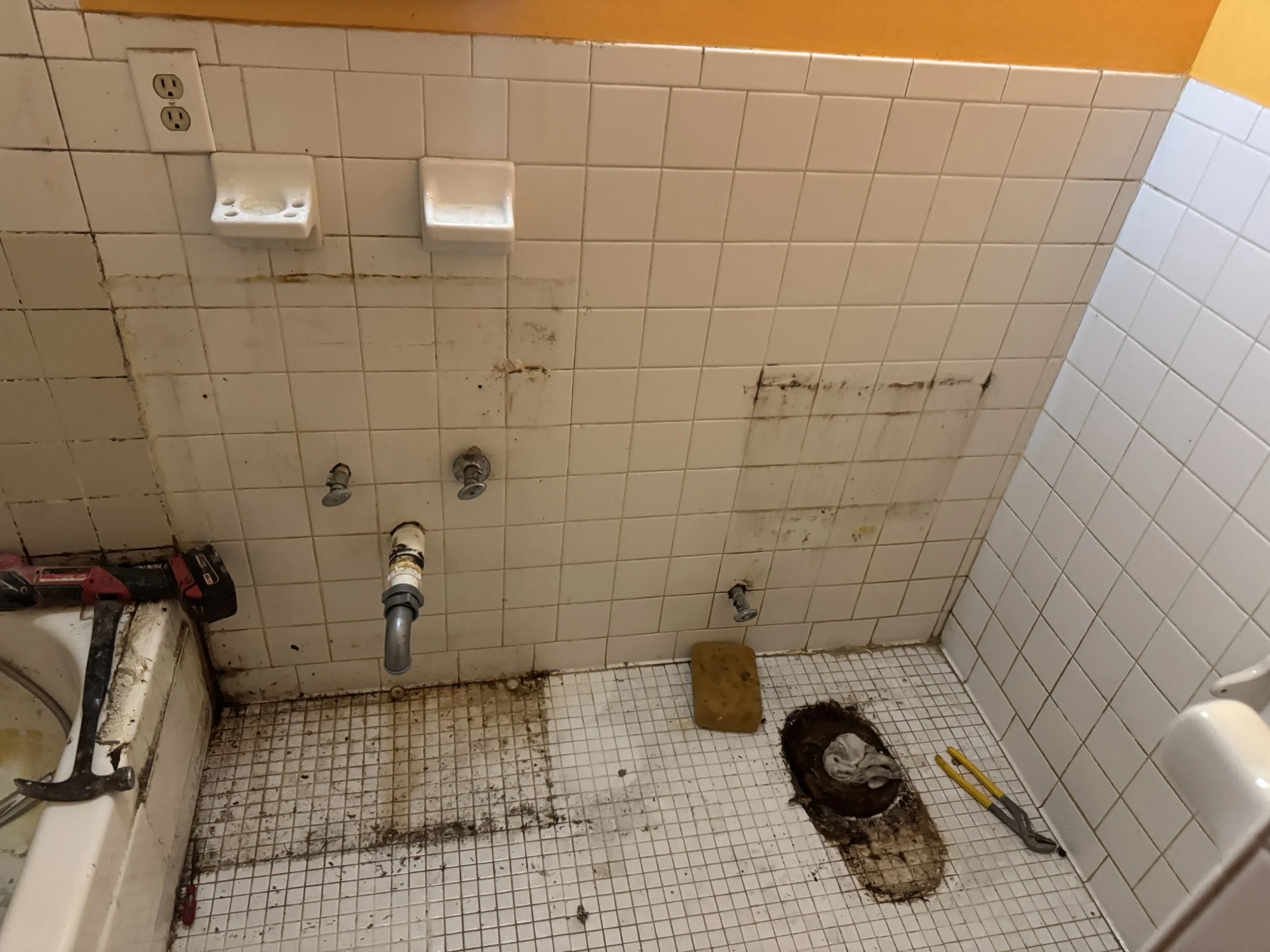 Full bathroom renovation transforming outdated space