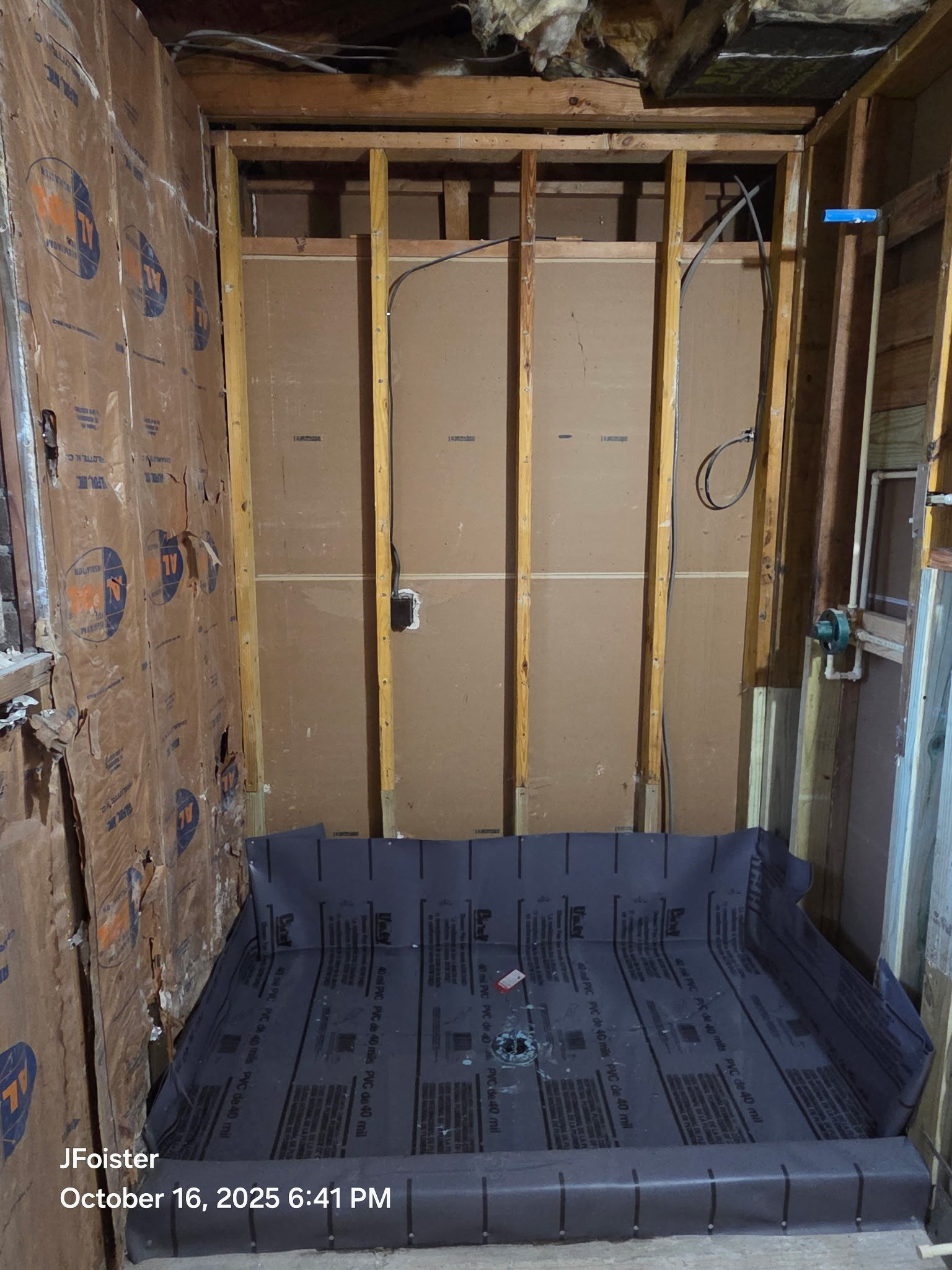 Rough-in and top-out plumbing phase for bathroom remodel