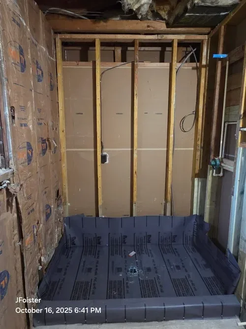 Rough-in and top-out plumbing phase for bathroom remodel