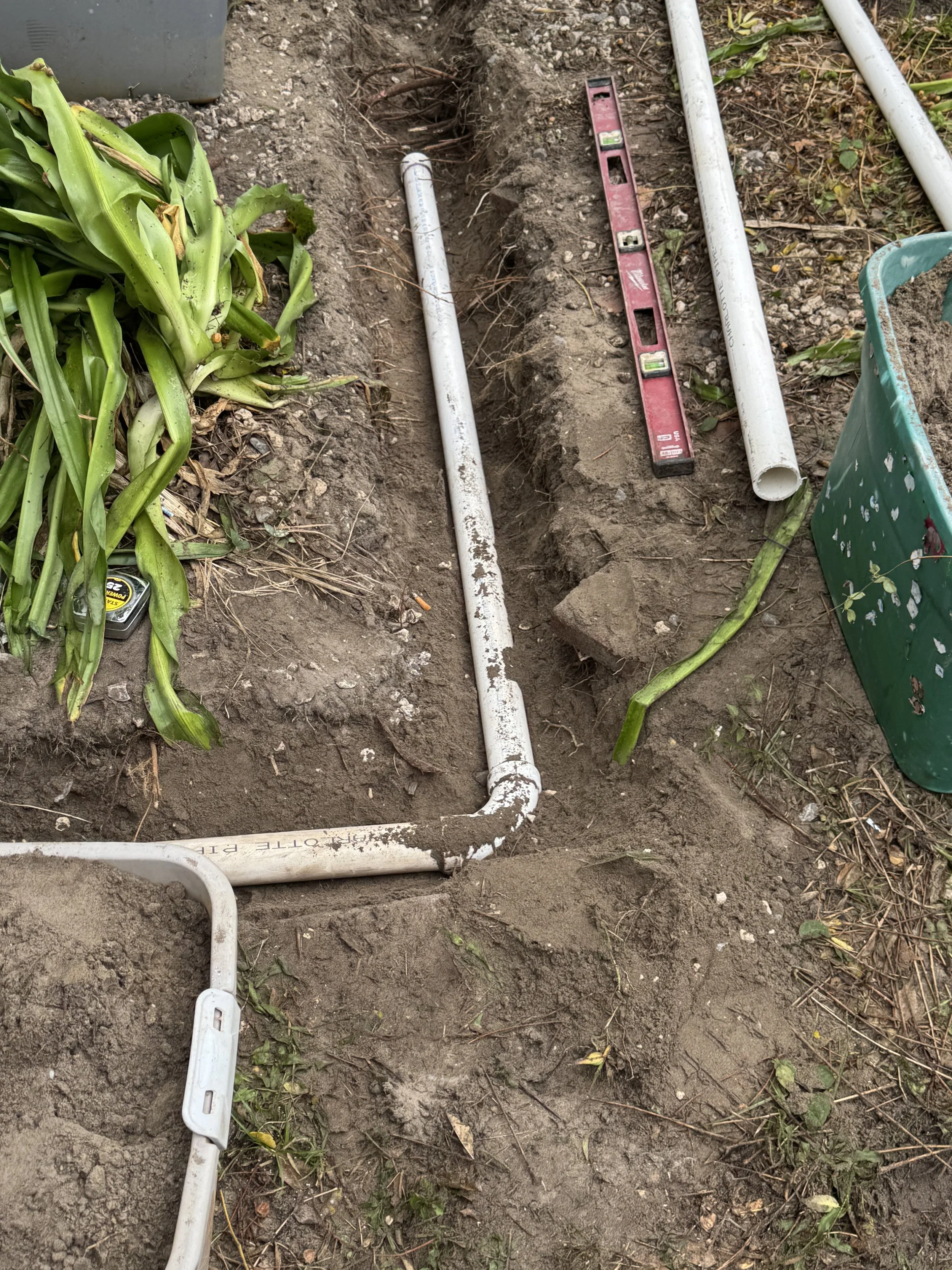 Plumber replacing corroded galvanized pipes with modern piping