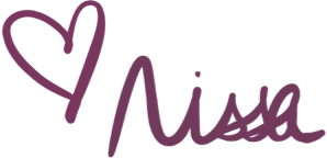 Hand-drawn purple heart and the name 'Nissa' written in purple script.