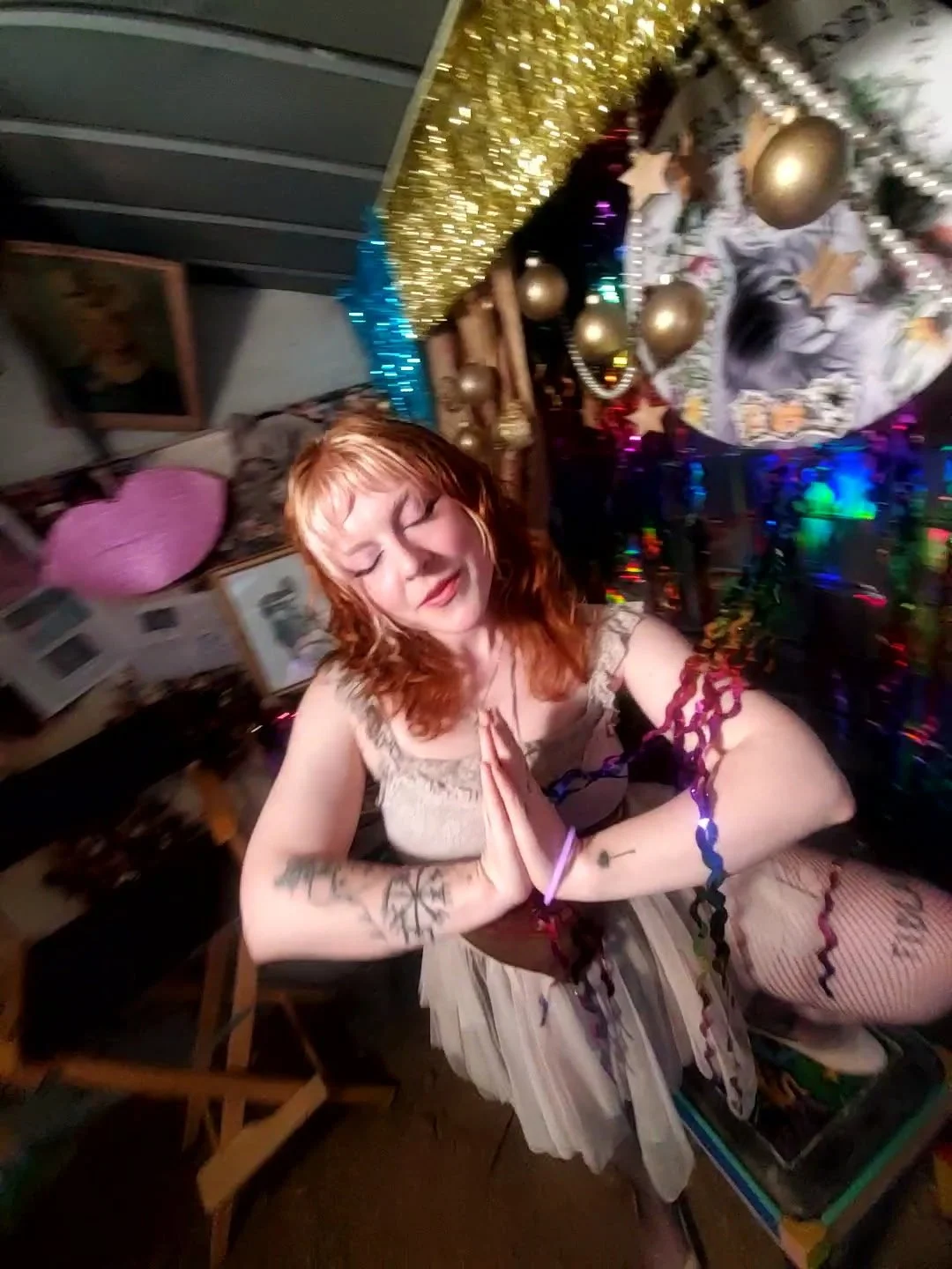 A photo of singer songwriter Earlie Grace Davis in an artist studio.