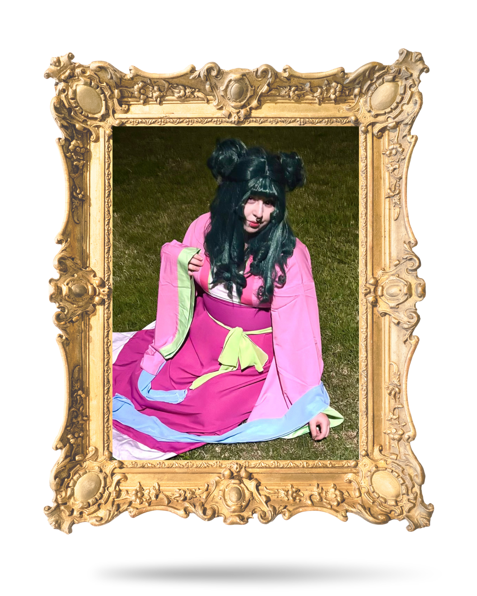 A cosplayer known as Star Light Cos, poses for a photo that is within an ornate floating golden frame.