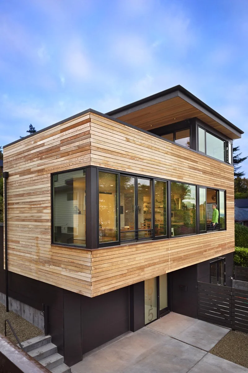 Rustic modern house with suspended cedar clad Great Room