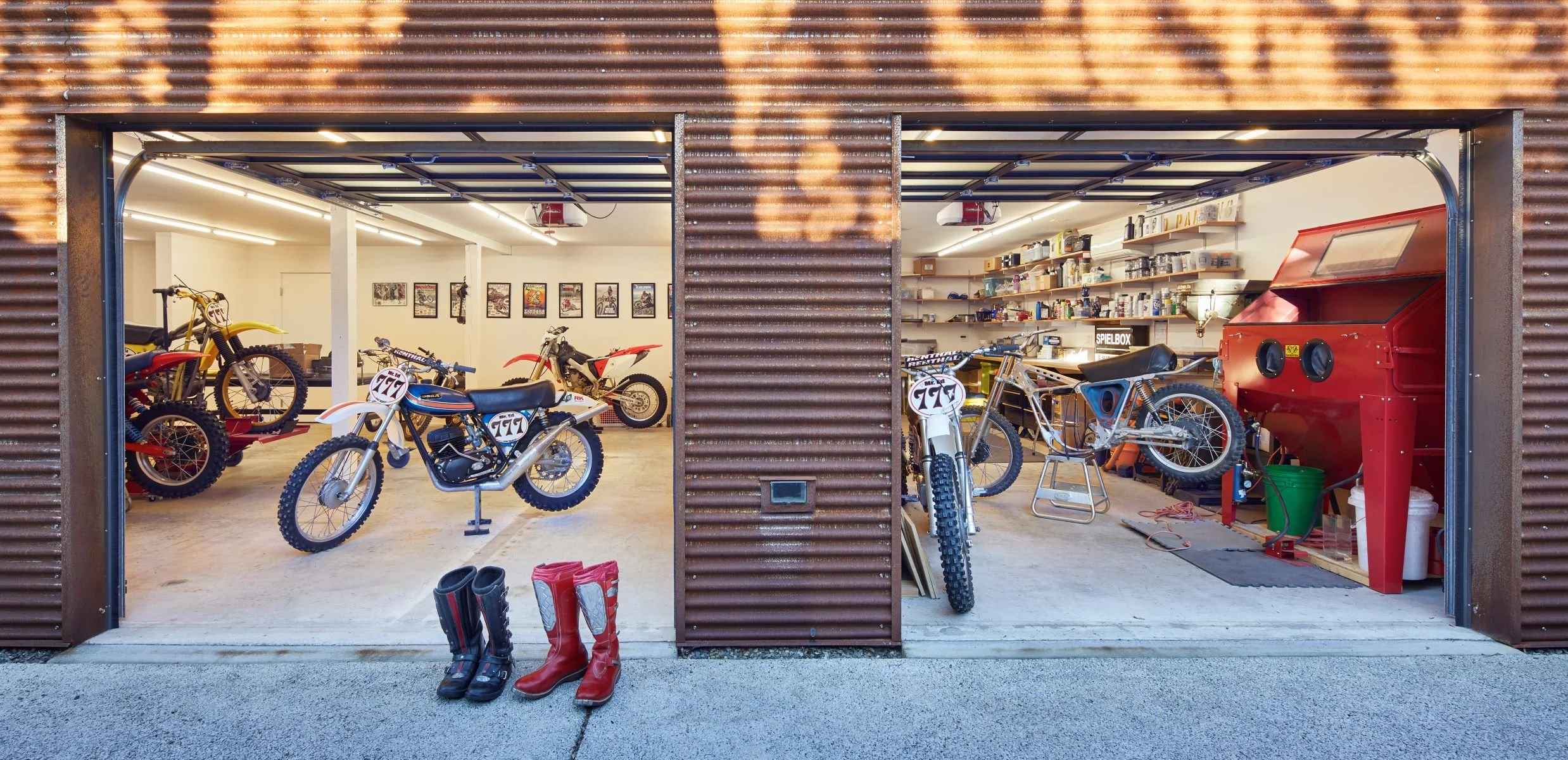 Roll up glass garage doors open to a Work Yard