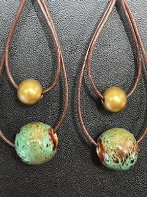 Brown leather and green bead earings2.jpg