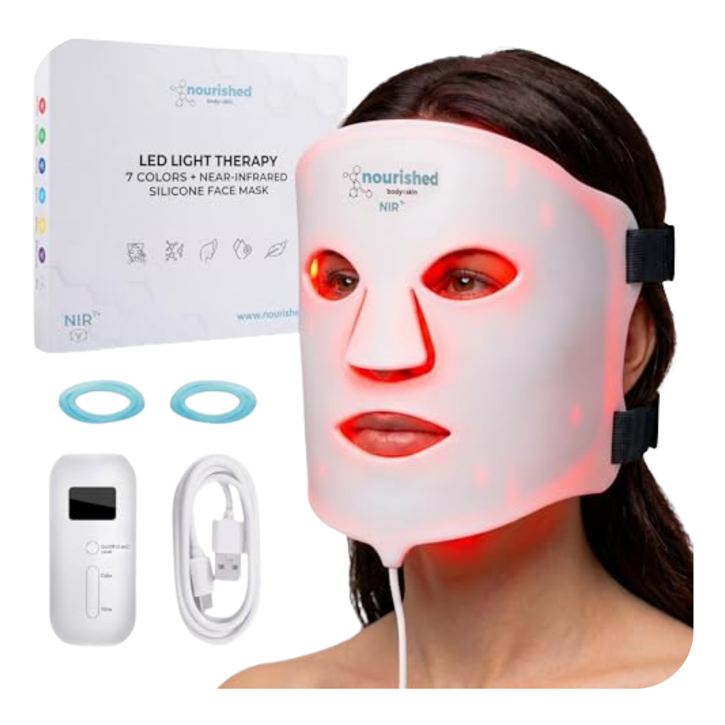 A woman is wearing a white silicone face mask that glows red around the eyes, nose, and mouth, with a red line down the center of the face. Beside her, there is a box labeled 'nourished' with the description 'LED Light Therapy 7 Colors + Near-Infrared Silicone Face Mask'. The box features icons of the mask's uses and a website URL. Two circular LED light therapy devices are also visible in front of the box.