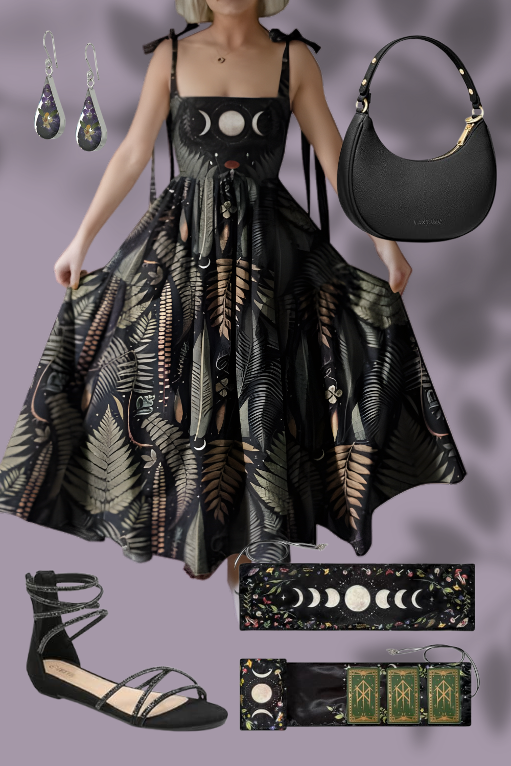 A woman in a black dress with a celestial and botanical pattern, paired with black ankle straps sandals, accessorized with celestial-themed earrings, a black handbag, and tarot cards, against a purple background.