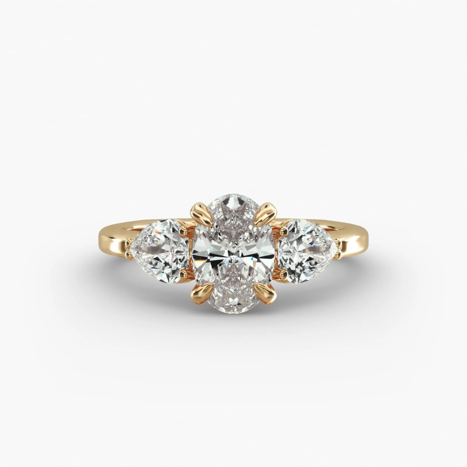 Gold ring with five large diamonds arranged in a floral pattern on a white background.