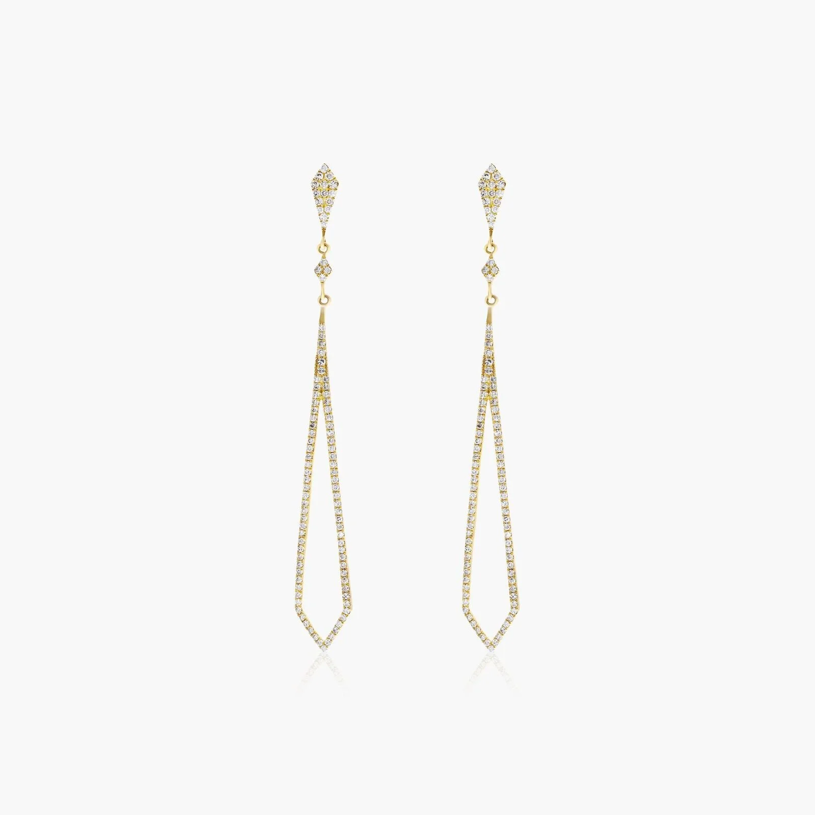 Gold and diamond dangling earrings with geometric design and sparkle.