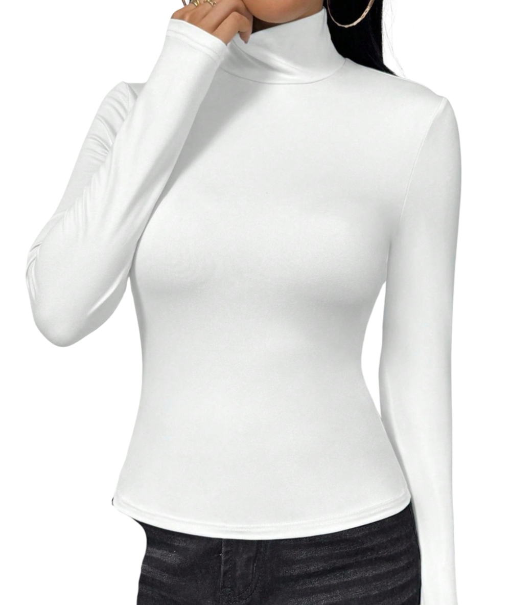 Woman wearing a white turtleneck long sleeve top and black pants.