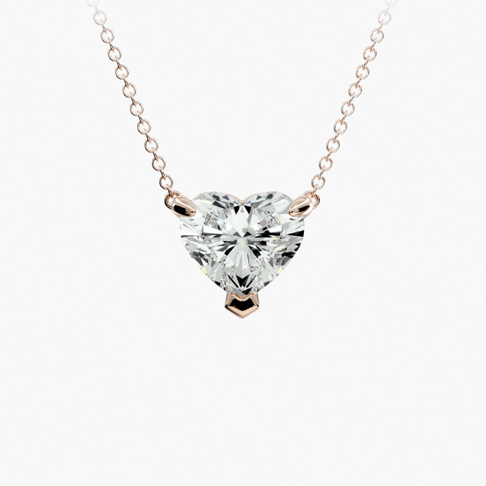 A necklace featuring a heart-shaped diamond pendant on a delicate chain.