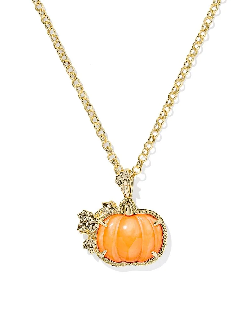 Gold necklace with a pumpkin-shaped pendant and decorative leaves.