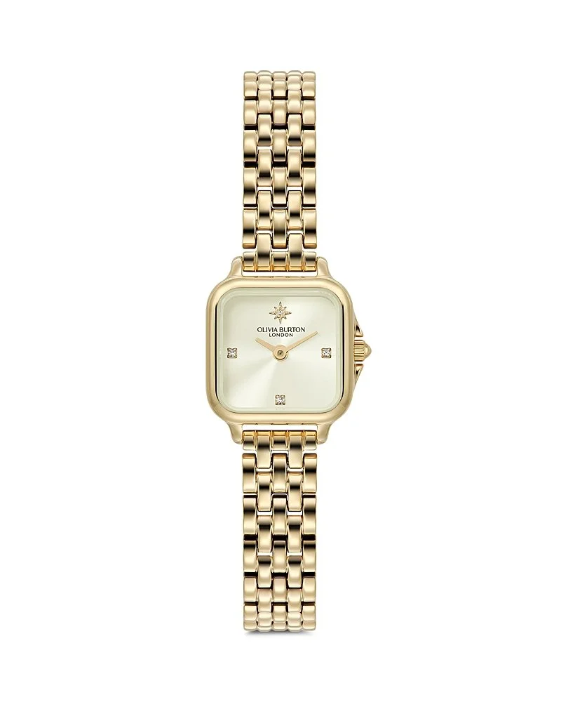 Gold women's wristwatch with a square face, diamond accents at 12, 3, 6, and 9 o'clock, and a metal link band. The watch face has the brand name Olivia Burton London.