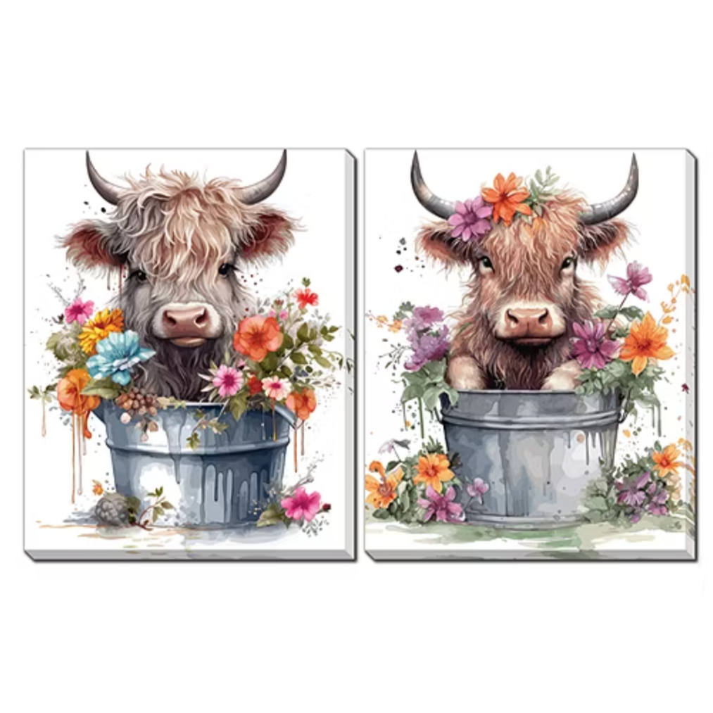 Two colorful watercolor paintings of Highland cattle calves in flower pots, one with a fluffy white calf and the other with a brown calf, both adorned with flowers and horns.